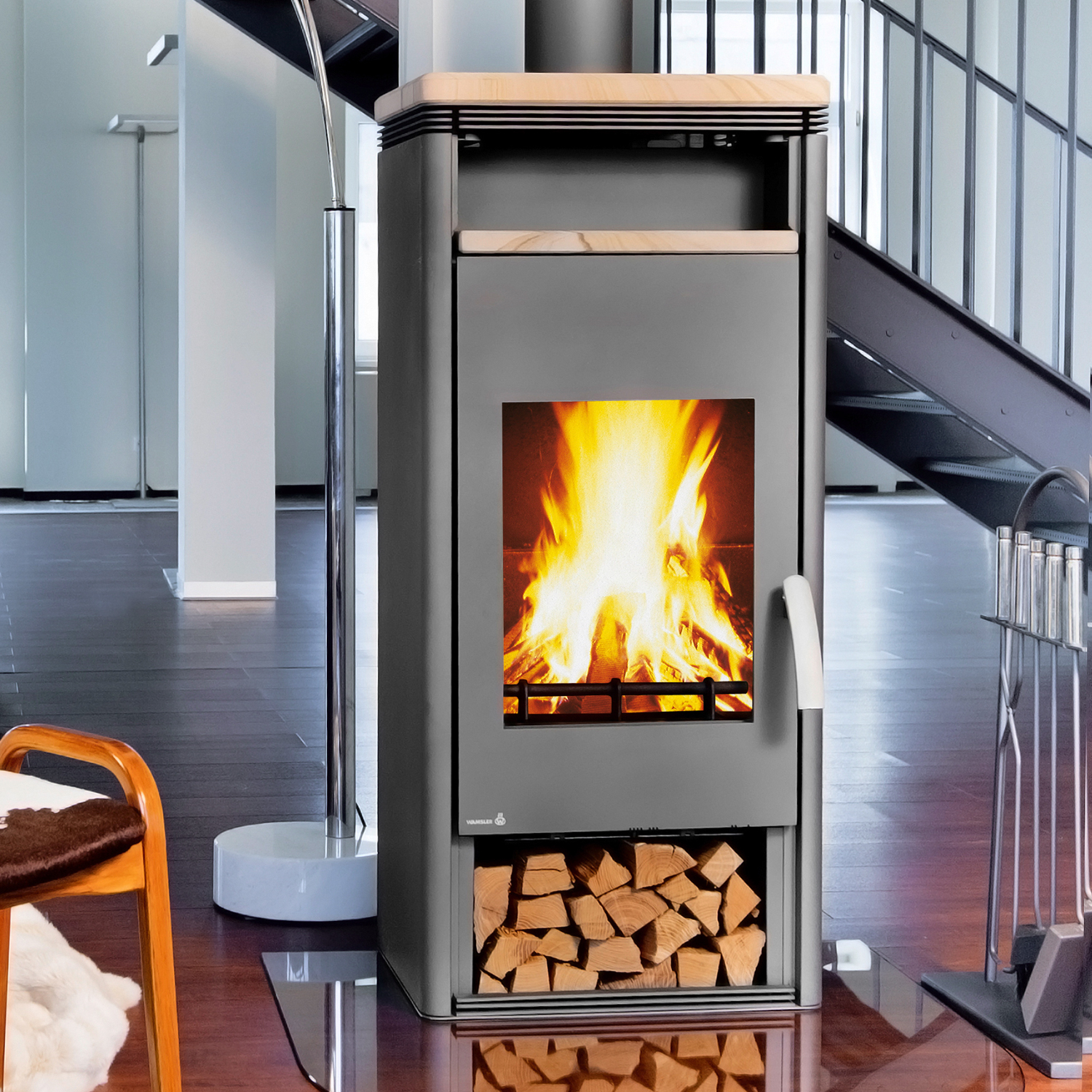 Poêle à bois Wamsler Orpheus avec compartiment de maintien au chaud en acier gris / pierre de sable 8 kW