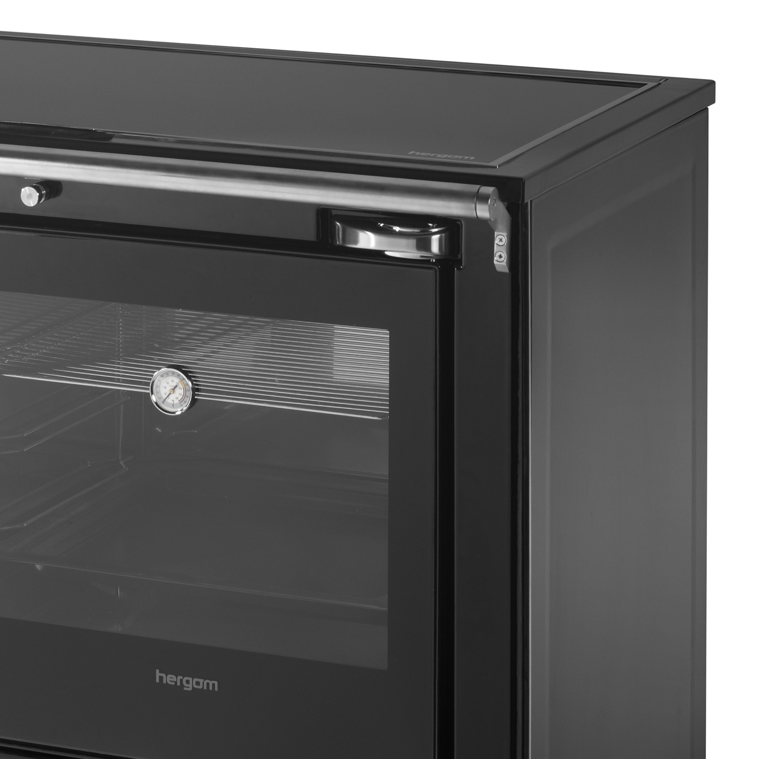 Hergom Eclecsys 100 SE cuisinière en fonte noire, avec couvercle de cuisinière en vitrocéramique.