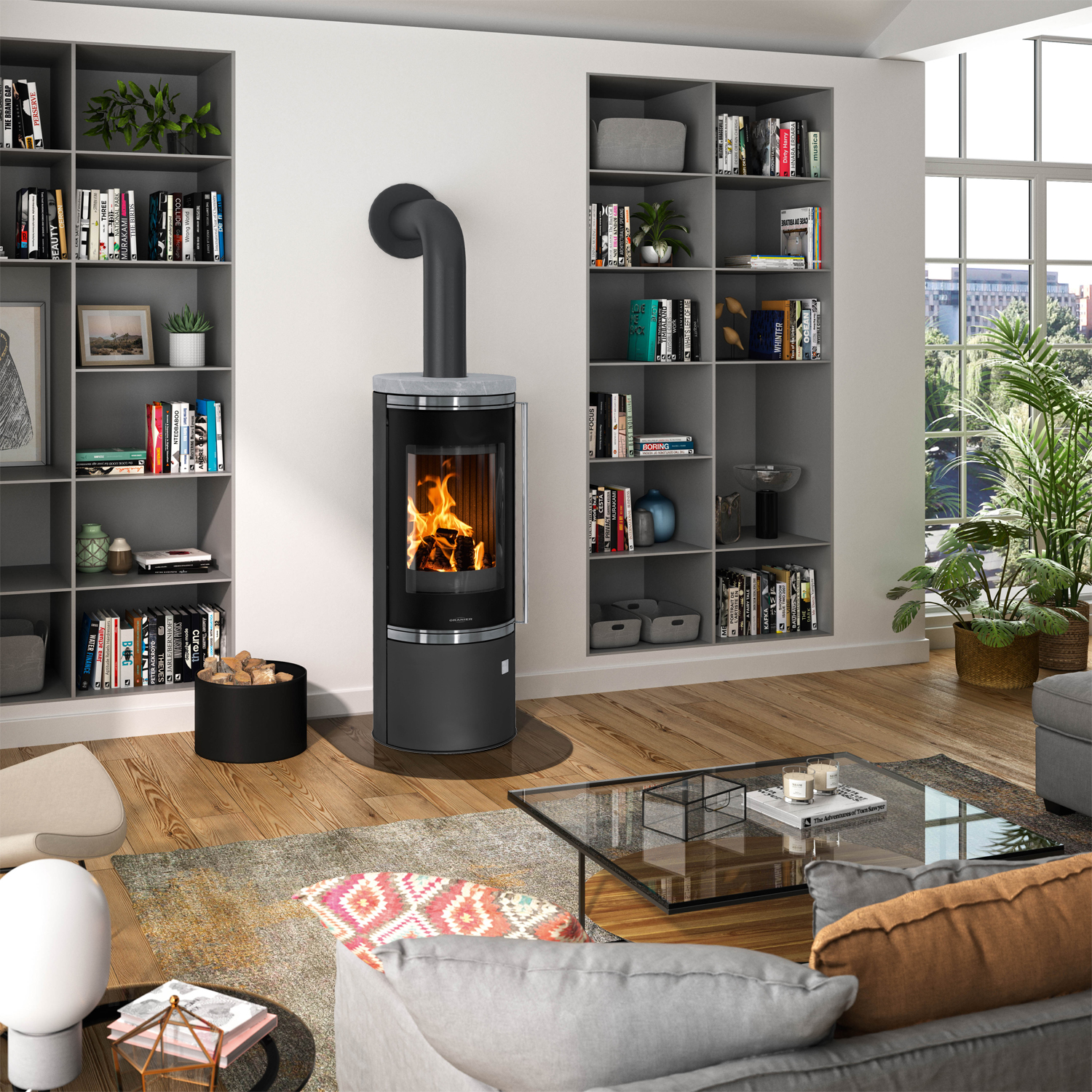 Poêle à bois Oranier Arena 2.0 en acier noir avec plaque de recouvrement en stéatite. Poêle à bois Oranier Arena 2.0 en acier noir avec plaque de recouvrement en stéatite.